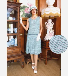 1920s summer dress of printed light blue chiffon with a ruffled skirt detail